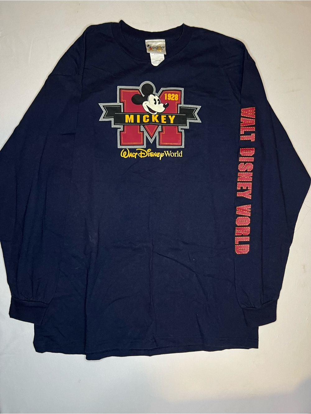 Disney Navy Mickey Graphic Long Sleeve Tee with Red and Yellow Accents